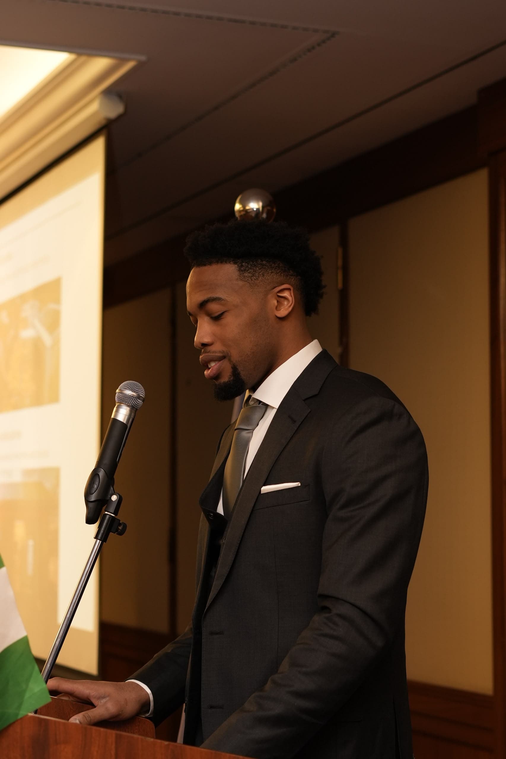 E.J. Anosike speaking to an audience